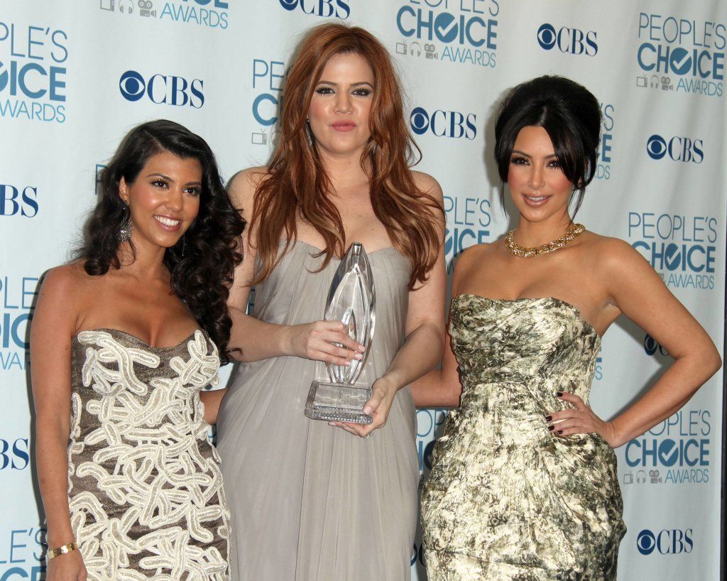 LOS ANGELES - JAN 05: Kourtney, Khloe & Kim Kardashian arrive in the press room at the People's Choice Awards 2011 on January 05, 2011 in Los Angeles, CA