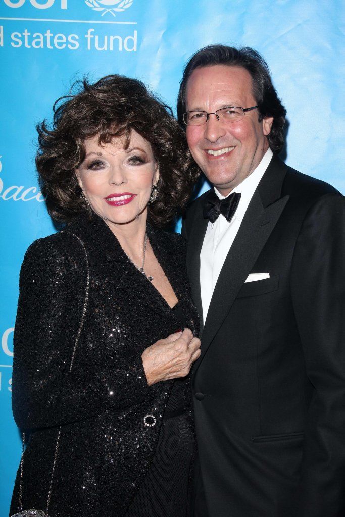 Joan Collins and Percy Gibson at the 2011 Unicef Ball, Beverly Wilshire Hotel, Beverly Hills, CA 12-08-11