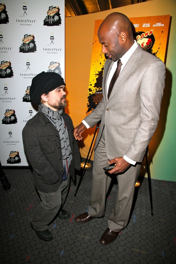 NEW YORK - JANUARY 16 : Peter Dinklage (L) and Romany Malco attend the "Saint John Of Las Vegas" New York Premiere on January 16th, 2010 in NYC