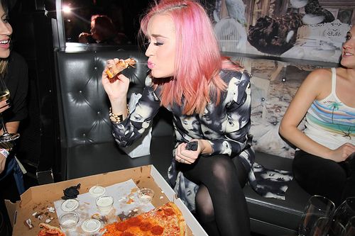 celebs caught eating pizza