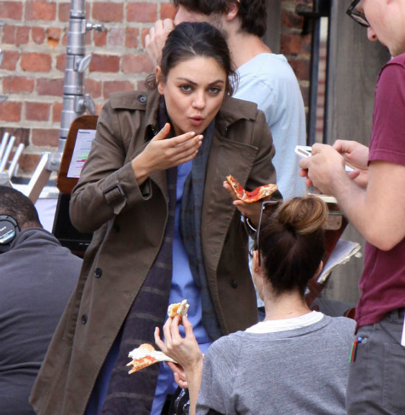 celebs caught eating pizza