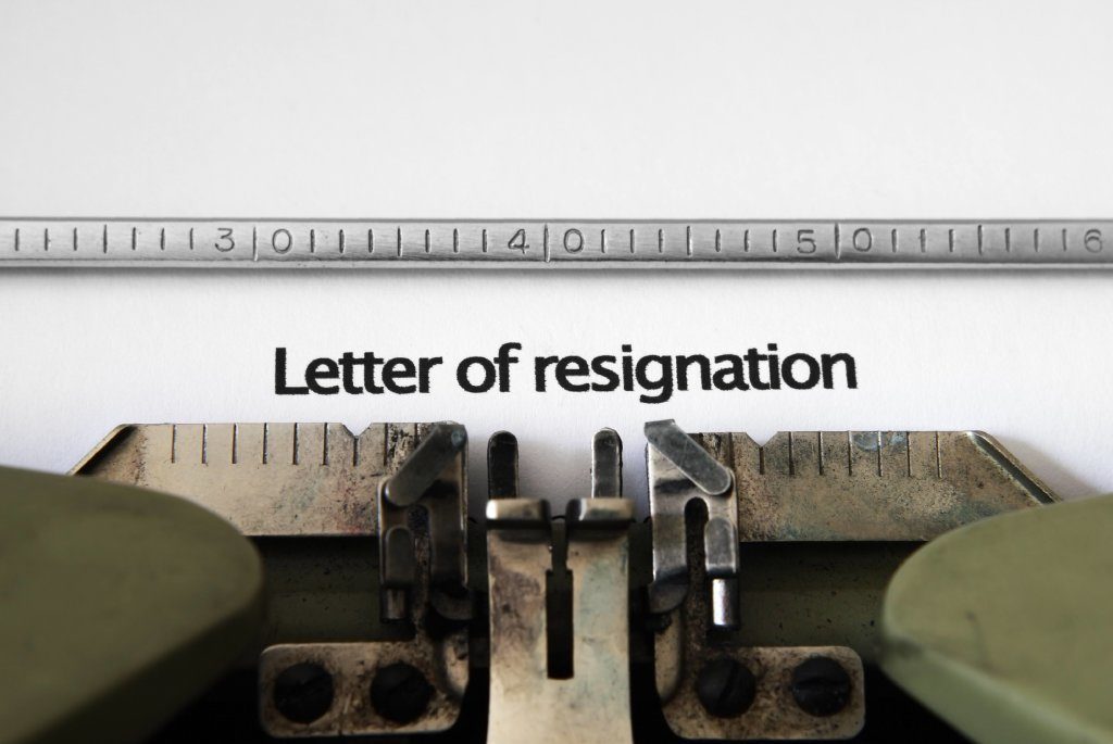 resigning