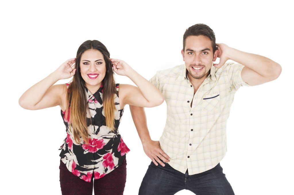 Lovely Hispanic Couple Doing The Macarena