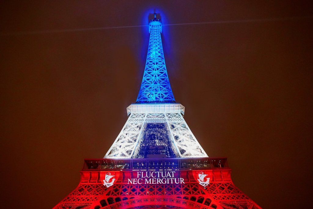 Eiffel Tower Illuminated With Colors Of The French National Flag