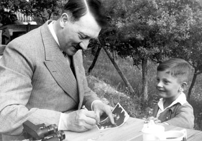 Hitler signing autograph